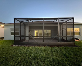 Custom screen enclosure on a residential patio