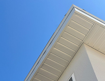 Soffit and fascia installation on a residential roofline