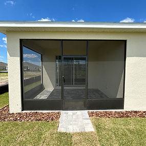 Screen fill-in enclosure under an existing covered patio
