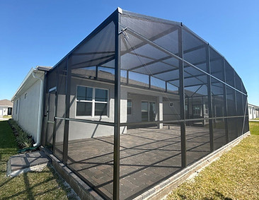 Custom screen enclosure built over a residential patio
