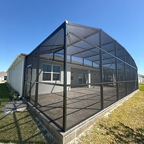 Custom screen enclosure on a residential patio in Central Florida