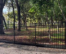 Aluminum fence installation around a residential property