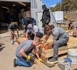 NAU physical therapy students helping build a tiny home