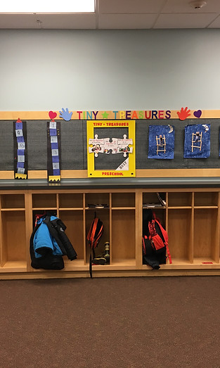Our artwork display above the children's cubbies