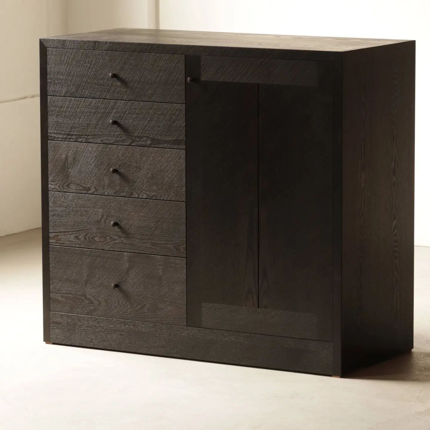 Diagonally carved iron dyed black cabinet