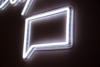 white neon light signage on wall.jpg