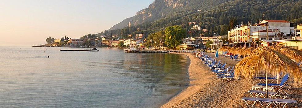 Benitses Corfu beach with crystal clear water
