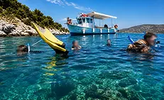 corfu-snorkeling-fishing-1920-blurred.webp