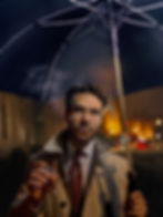 Enjoying a Charatan under an umbrella.