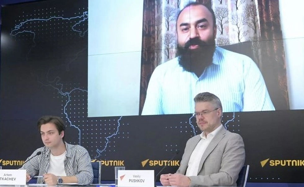 Artem Tachkev and Vassili Pouchkov in a video conference with Avdhesh Mathur, president of the Indian nationalist think tank Visvaniti Foundation