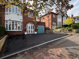 Residential garden makeover with front driveway renovation and professional landscaping services