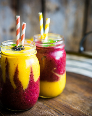 Colorful two layer smoothies with mango 