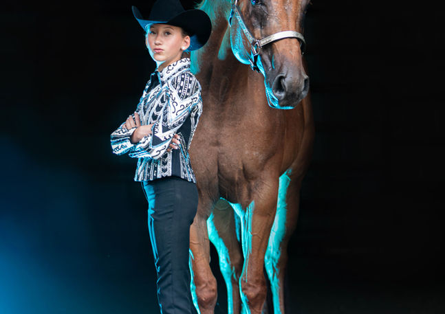 standing girl with horse