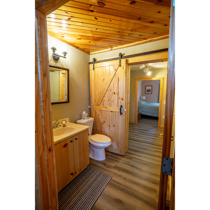 second floor bedroom bathroom at 3 story barn rental property in northern wisconsin