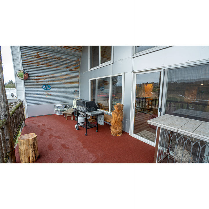 second floor back porch at 3 story barn rental property in northern wisconsin