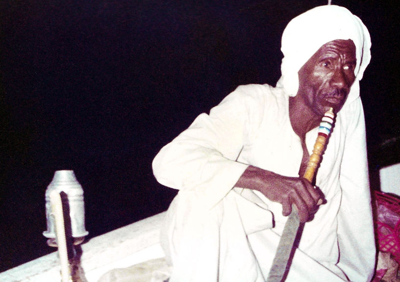The captain of a felucca, Nile River, between Aswan and Luxor, Egypt, 1988