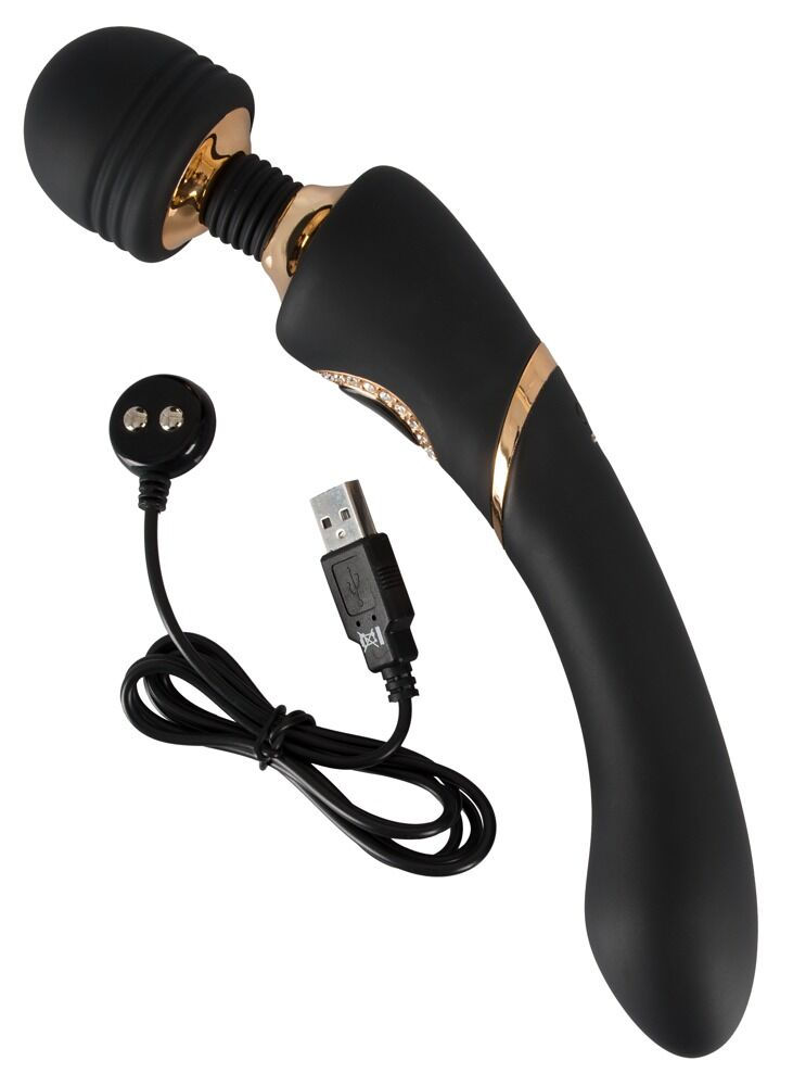 Thumbnail: schwarzer Wand Massager mit goldfarbenen Applikationen und Schmucksteinen, liegend mit dem Ladekabel daneben