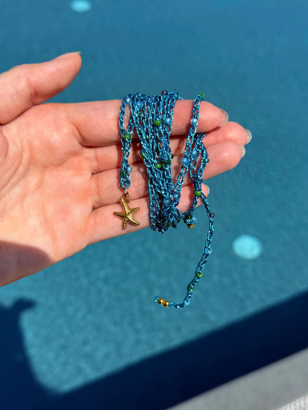 Miniatura: Filacuore azzurro con stella marina