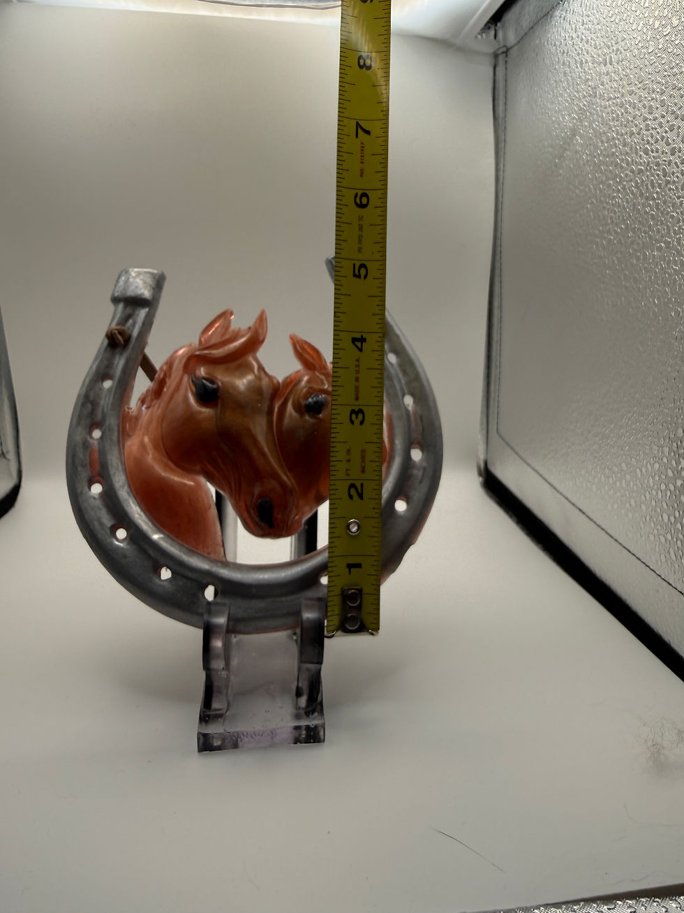 Thumbnail: Western horseshoe horse head wall decor shown with measuring tape for size reference