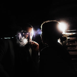 Colorado Elopement with a unity joint in front of the headlights after their elopement ceremony