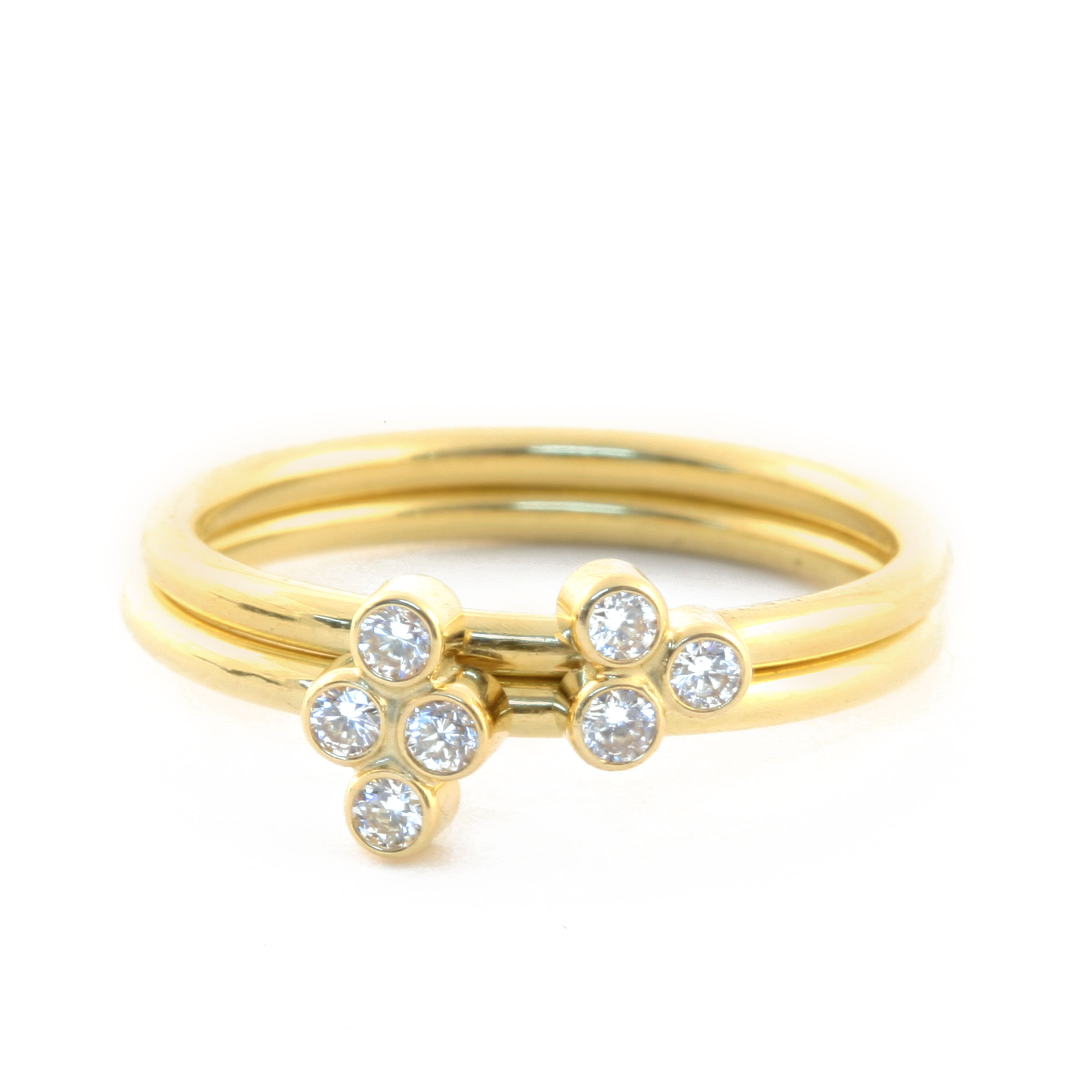 Multi-Diamond Stacking Rings in 18k Gold.