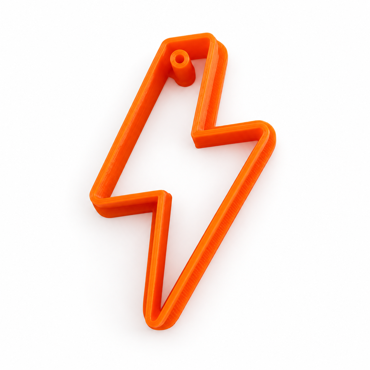 Emporte-pièce Éclair Énergie orange pour créole, avec perforateur intégré — photo retouchée Forméa
