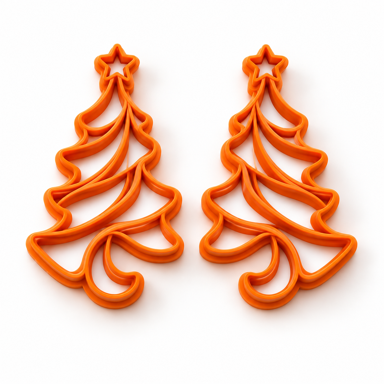 Sapin drapé — Collection Noël : deux emporte-pièces orange en miroir, gauche et droite
