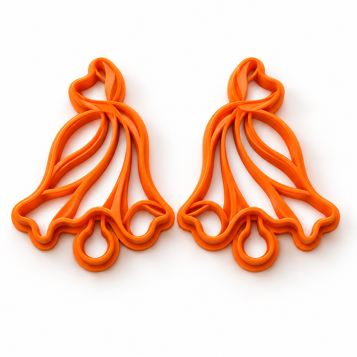 Cloche de gala — Collection Noël : deux emporte-pièces orange en miroir, gauche et droite