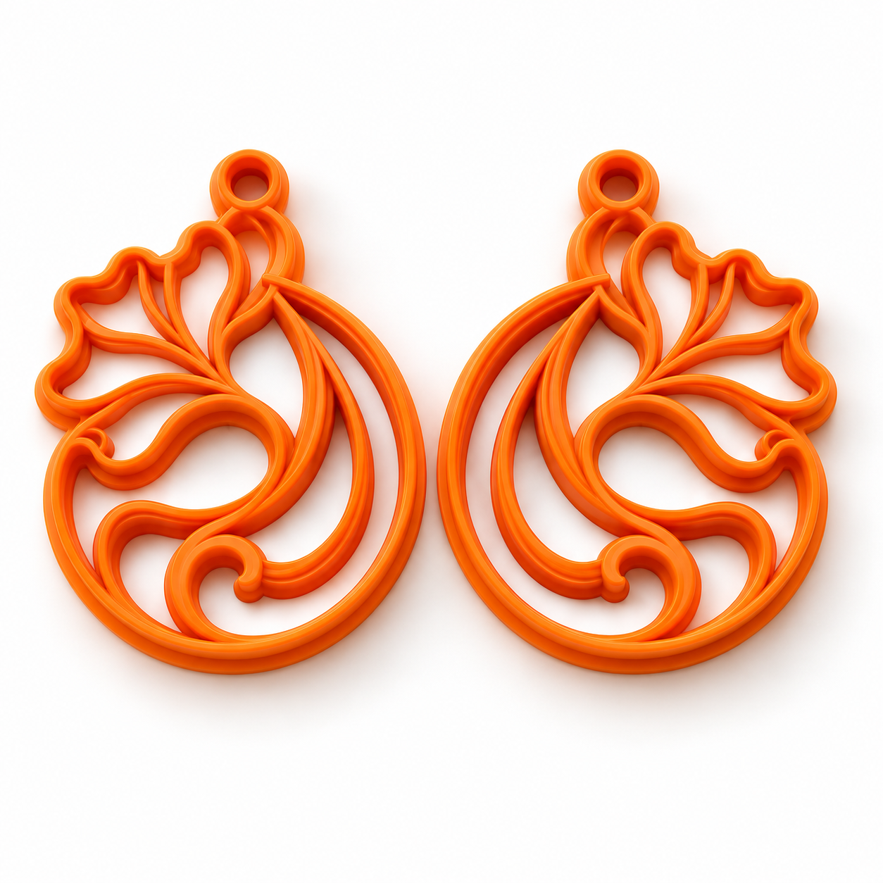 Boule des vagues — Collection Noël : deux emporte-pièces orange en miroir, gauche et droite
