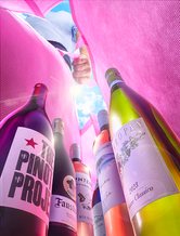 Colorful beverage bottles photographed in commercial lifestyle campaign