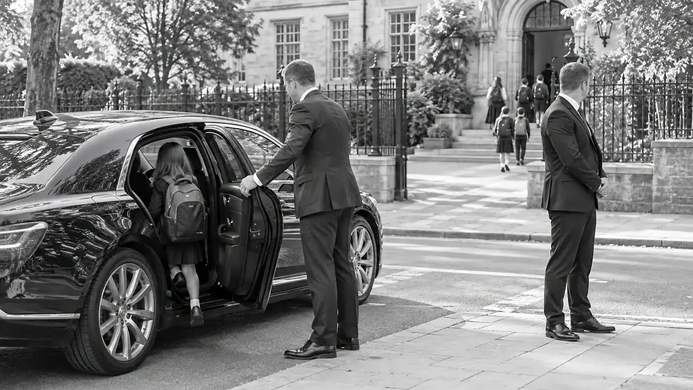 Close protection officer covering a child's arrival at school under a family security programme