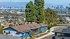 Aerial drone photo of a Los Angeles home showing the roofline, backyard and full lot from about 200 feet