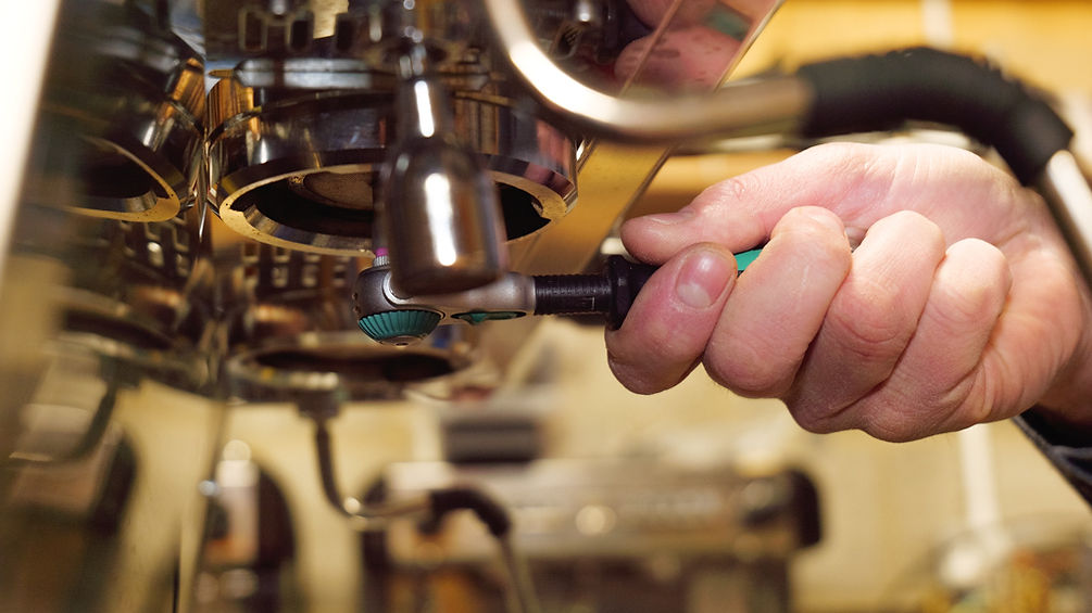Coffee machine being repared