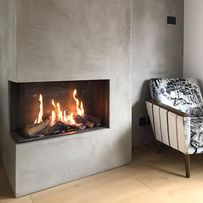 Modern fireplace inset into stone