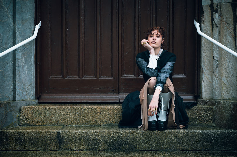 Model Isis Davidge of Mustard Models poses in vintage-inspired fashion amid the haunting beauty of a decaying historic setting in “Love, Lest We Forget,” a nostalgic editorial photographed by Forest Lewis that explores memory, romance, and the passage of time.