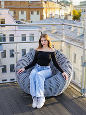 A striking photo series featuring model Alexandra Tarakanova, captured on a rooftop setting. The images portray a youthful and rebellious spirit, with Alexandra showcasing diverse expressions and poses against urban backdrops. The series highlights the themes of freedom and exploration, emphasizing the raw beauty of youth in a cityscape.