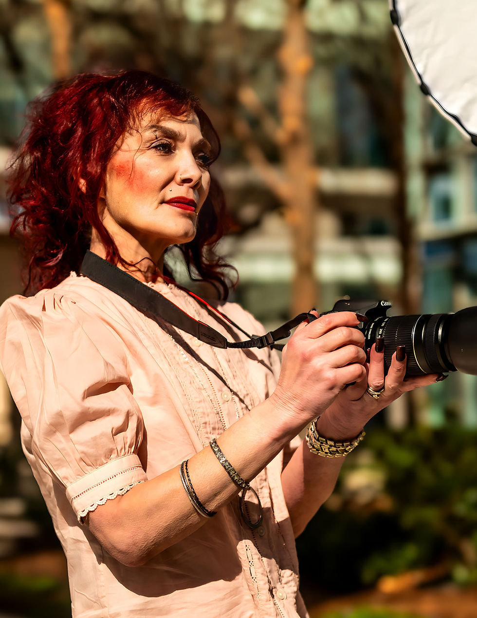 A stylish photo series featuring model Kristi Brinkman, titled “Infinite Chic.” The images showcase Kristi in a variety of poses, exuding sophistication and grace. Each photograph highlights her fashion sense and the timeless appeal of chic aesthetics, set against diverse and artistic backdrops.