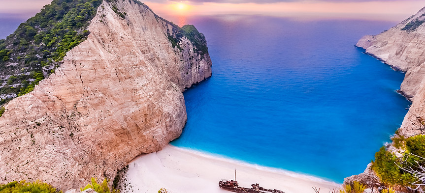navagio-beach-with-shipwreck-sunset-zaky