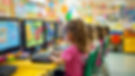 young-children-colorful-classroom-engage-with-educational-computer-games-sitting-row-de.jp
