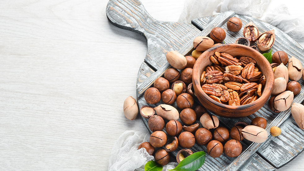 set-nuts-pecans-macadamia-nuts-bowls-white-background-top-view-free-space-your-text (1).jp