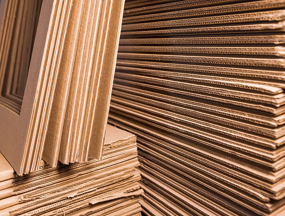 close-up-sides-stacks-cardboard-folded-top-each-other-concept-storage-boxes-environmentall