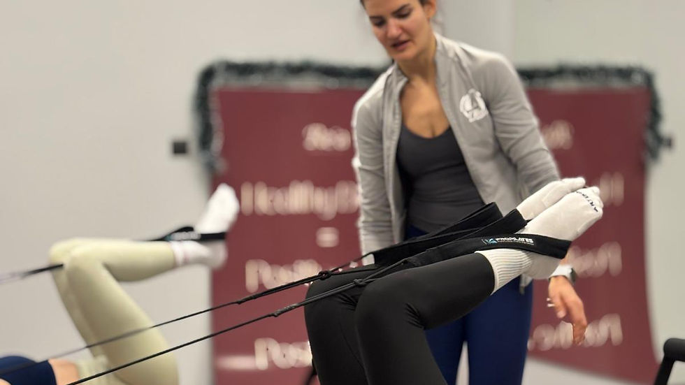 Close-up view of Pilates equipment in a bright and airy studio