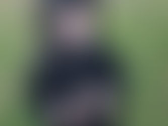 A boy holding two sticks