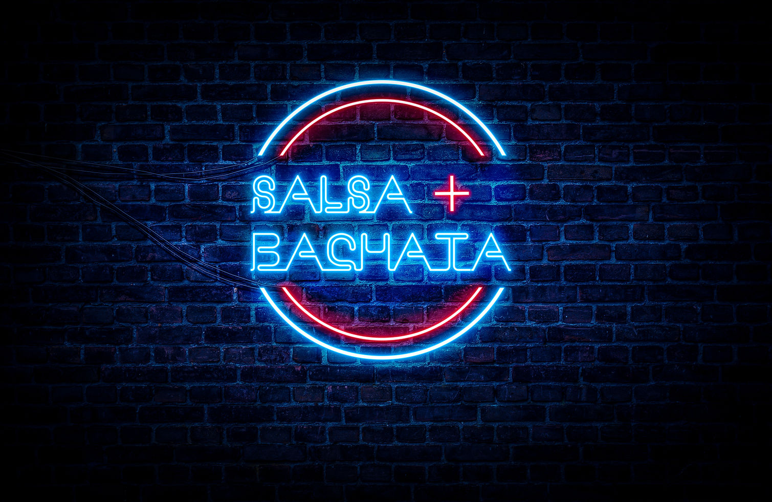Salsa and Bachata written on a red and blue neon sign, with a brick wall in the background