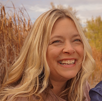 head shot smiling blond woman in fall
