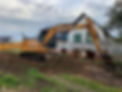 Excavator on home property