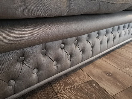 Close-up of grey fabric on sofa