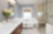 Lavish bathroom suite with walk-in shower.jpg