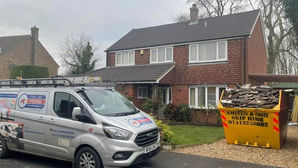 Stay Dry Roofing & Guttering van in front of property