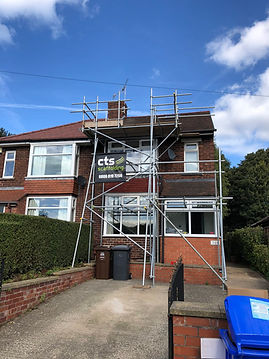 Semi-detached property with scaffolding around it